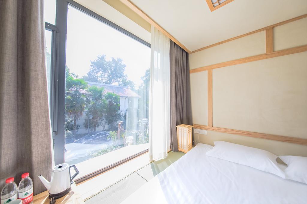 Hangzhou Van Wind Inn Exterior foto